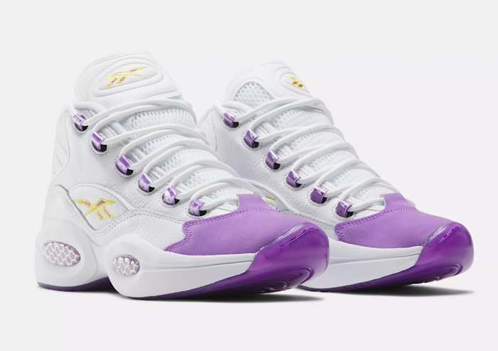 Side view of Kobe Bryant's purple and white Reebok sneakers.